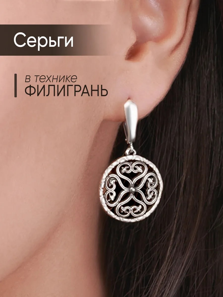 Восточные серьги с симметричным узором — фото 1
